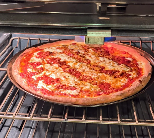 Mastering Authentic Pizza at Home with Your Kalorik Red High Heat Stone Pizza Oven